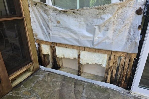 Exterior water damage before repair on Little Rock home