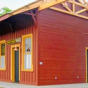 1900s train station converted to guest house carpentry project Arkansas