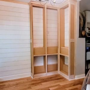 Custom slat wall with display shelves trim carpentry project Little Rock