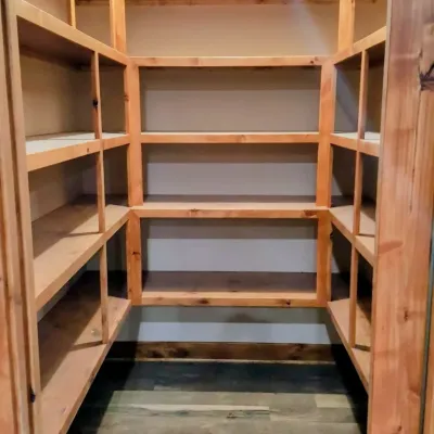 Walk-in pantry with custom-built shelving and storage in Central Arkansas